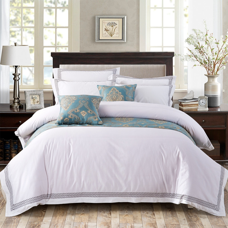 Bijela 6080S 100% pamuk hotelska posteljina za spavaću sobu s izvezenim strelicama